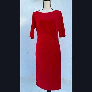 Stunning Tahari by Arthur S. Levine Dress. Ruched side with gold embellishment.